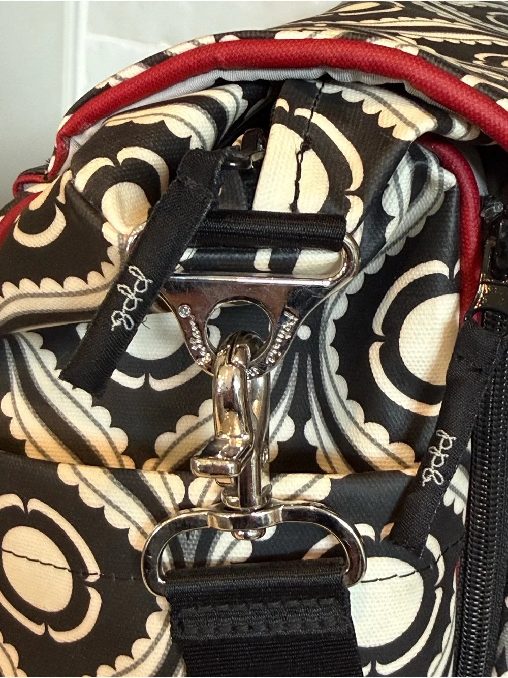 Petunia Pickle Bottom Black & White Geometric Baby Bag with Red Accent